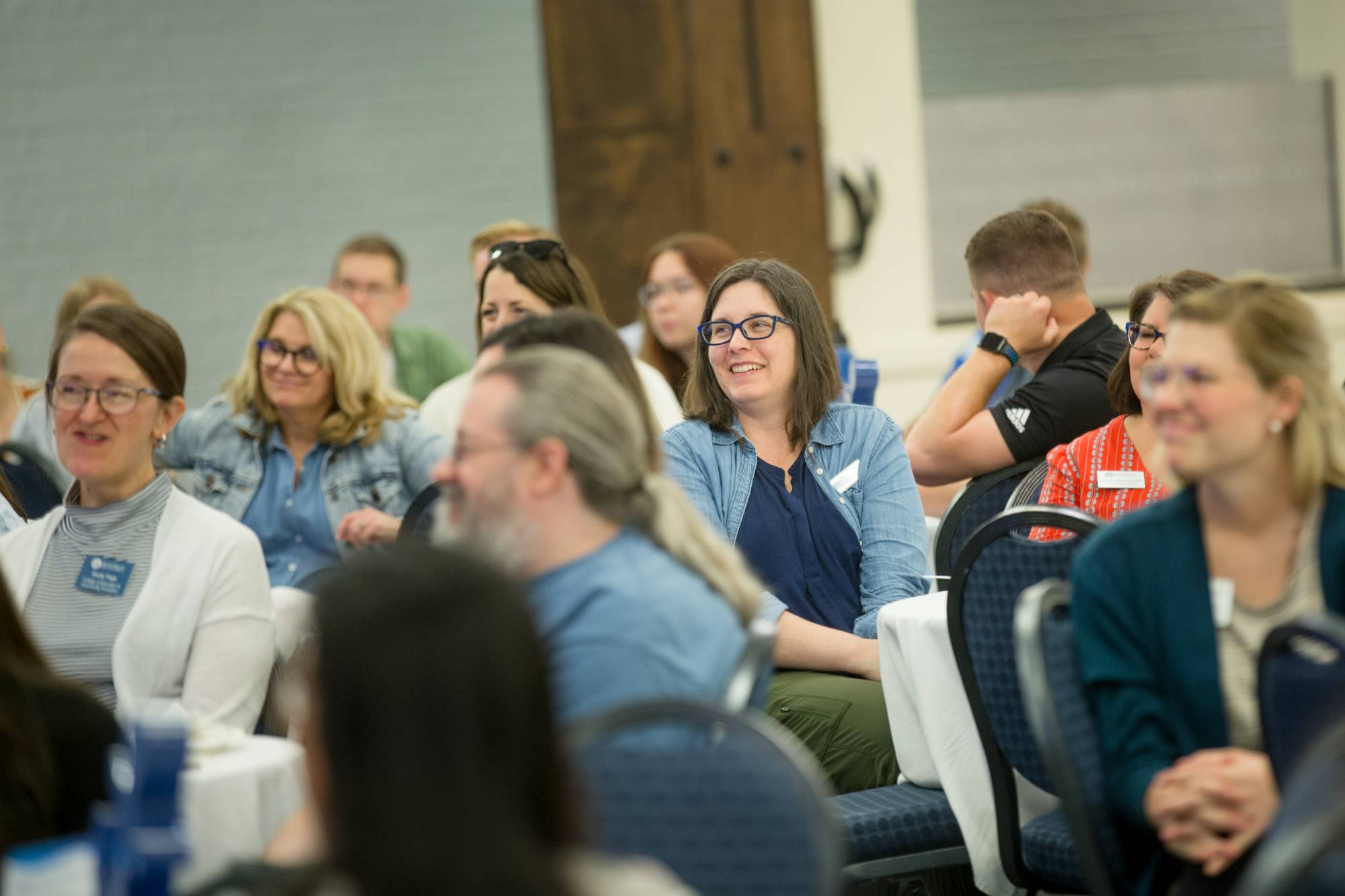 New employees sitting and smiling